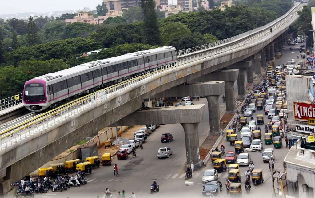 Will Namma Metro stop traffic jams? Namma Metro train passing MG Road as part of test run in Bangalore on Thursday. --KPN