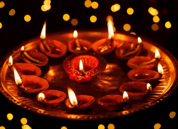 Ward off COVID negativity by lighting diyas